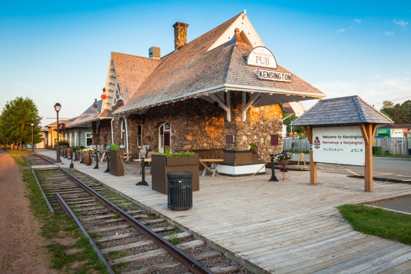 Outdoor shot of historic train station and rails in Kensington