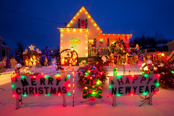 Small house decorated with holiday lights