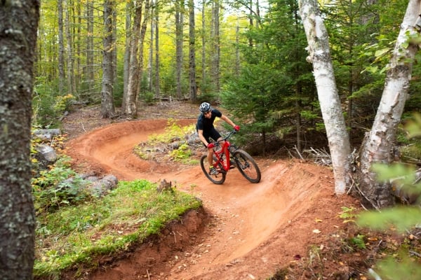 Male mountain biking at Brookvale on trail