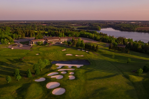 Aerial view of Mill River Resort golf course and hotel