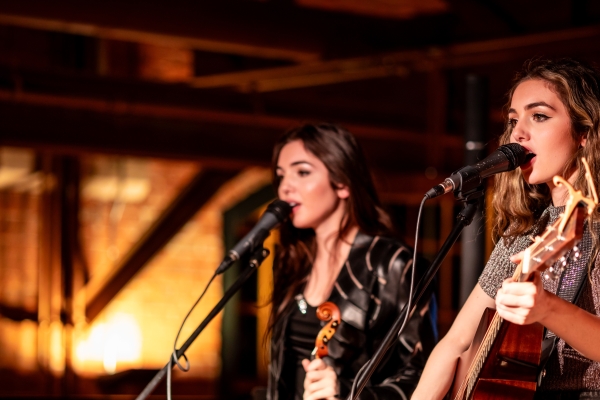 Ava and Lily Rashed perfom live music at Founders' Food Hall & Market