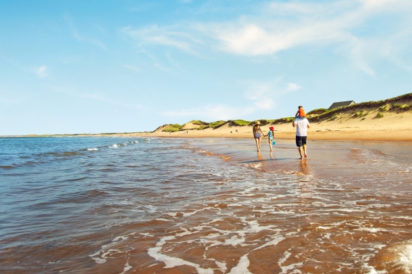 Family on the beach in St Peters Harbour