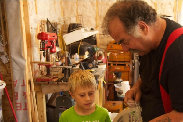 Peter talking with a child