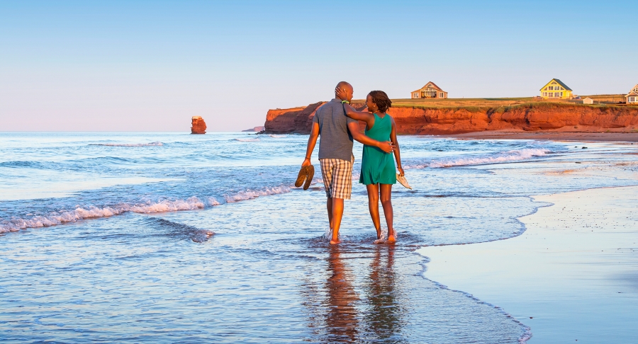 Sea View Beach, couple walking, back view, waves Sea View Beach, couple walking, back view, waves