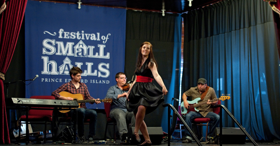 PEI Mutual Festival of Small Halls Step dancer on stage with band at Festival of Small Halls show