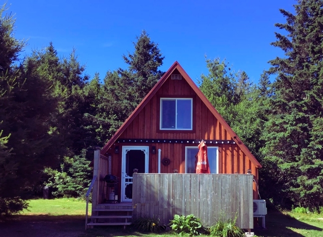Exterior view of Peaceful Country Cabin on wooded lot