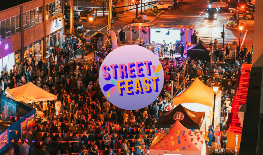 Aerial view of Charlottetown Street Feast in insert of logo
