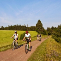 Ruth Delong riding a bike