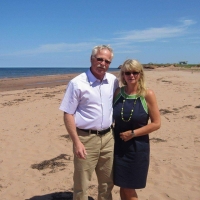 Sandi Lowther with spouse on a beach