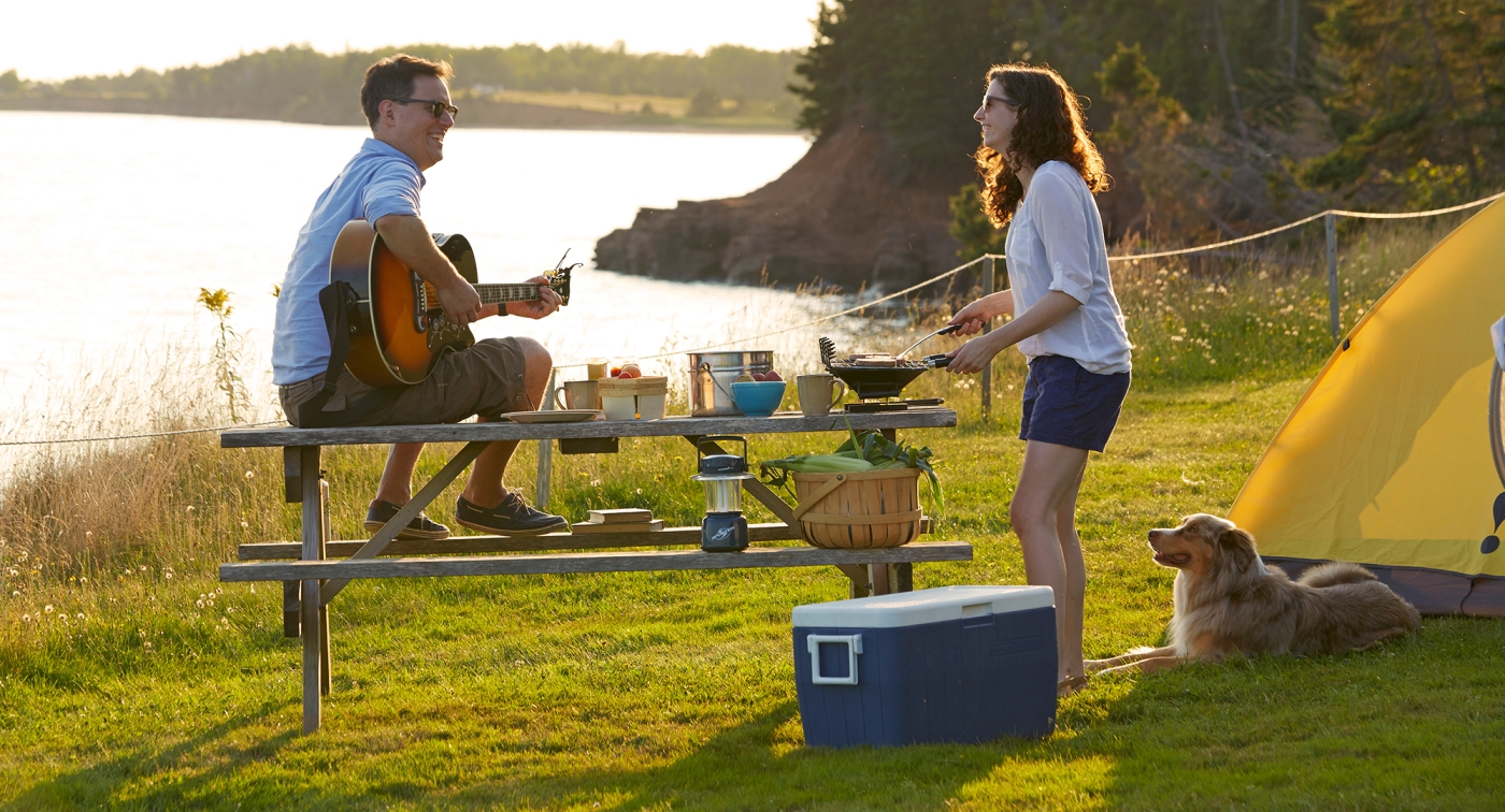Couple Camping, guitar, backlit Couple Camping, guitar, backlit