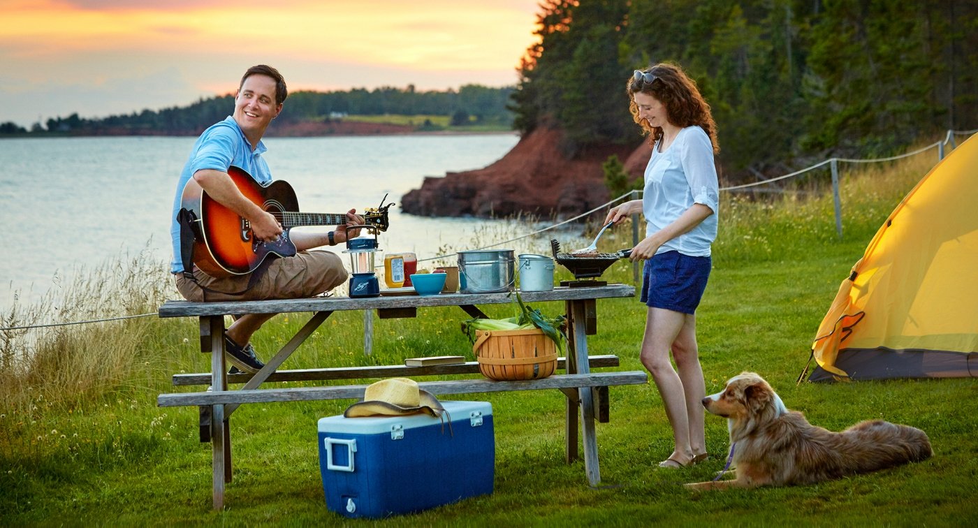Northumberland Camping, guitar, ocean, couple, dog