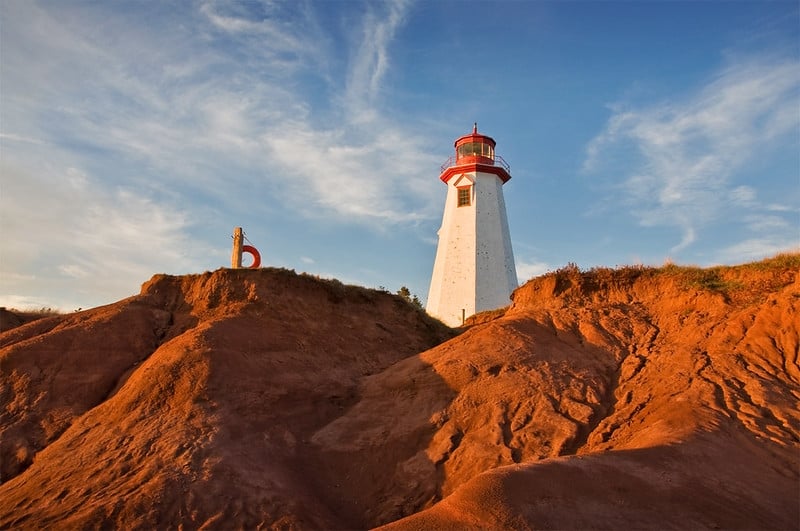 Seacow Head Lighthouse with red cliffs in front