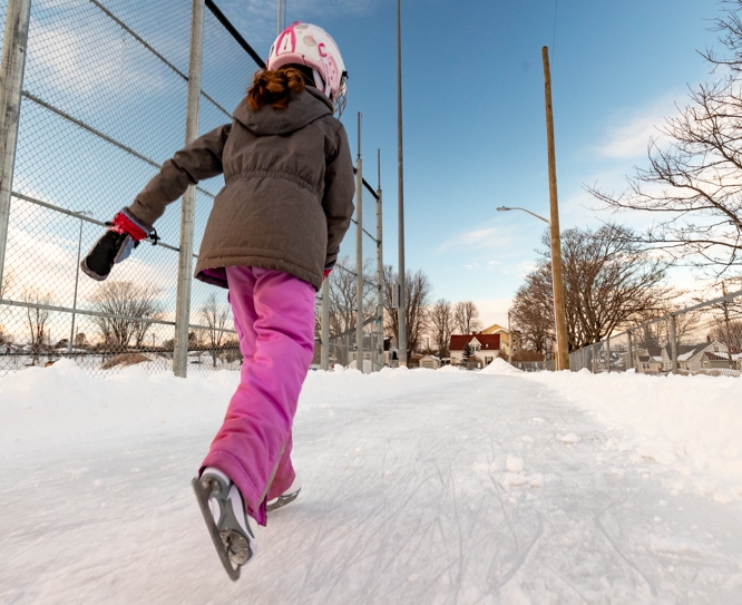 Young girl skating on oval at Queen Elizabeth Park, Summerside