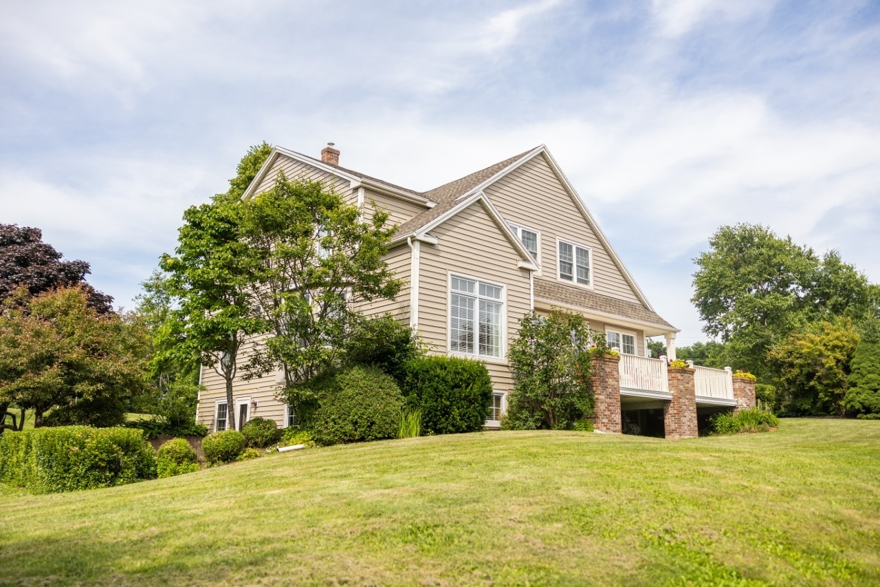 Beautiful large home surrounded by trees and green grass at 1 park lane , stratford