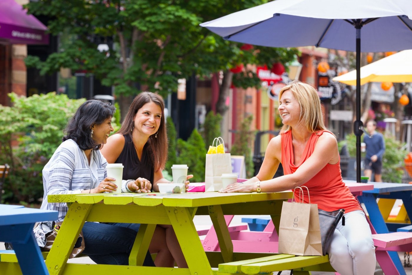 Group of females at picnic table on Victoria Row