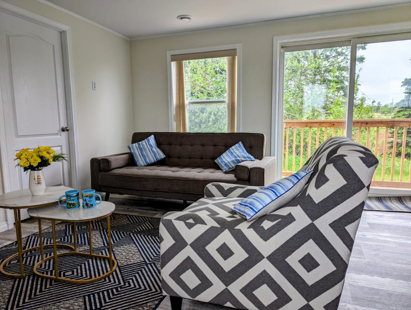 36317 Western rd inside photo of Livingroom with brown couch and patterned grey and white chair