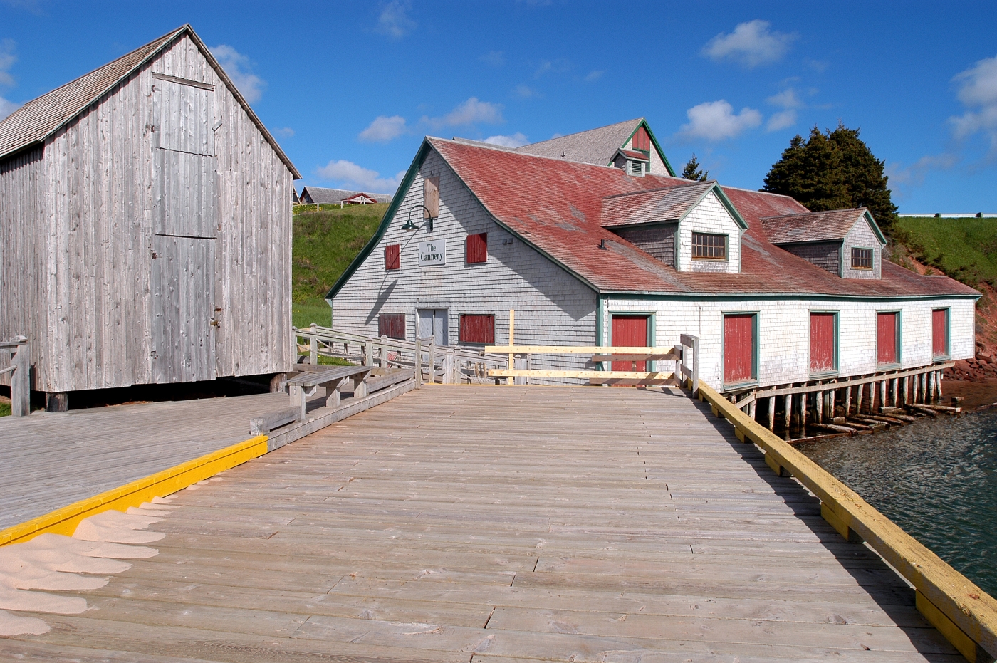 Exterior view of boardwalk and buildings at Basin Head Provinical Park