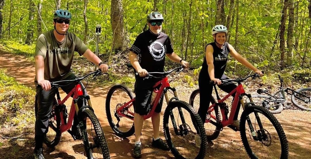 Trio on rental bikes at Brookvale MTB Park, 
