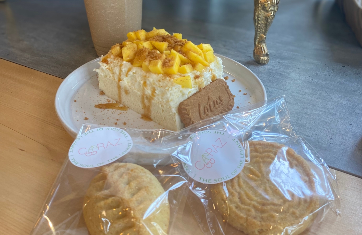 Caraz, Founders' Food Hall, Charlottetown, PEI Plated dessert with mango on top, iced coffee and date cookies, Caraz, PEI