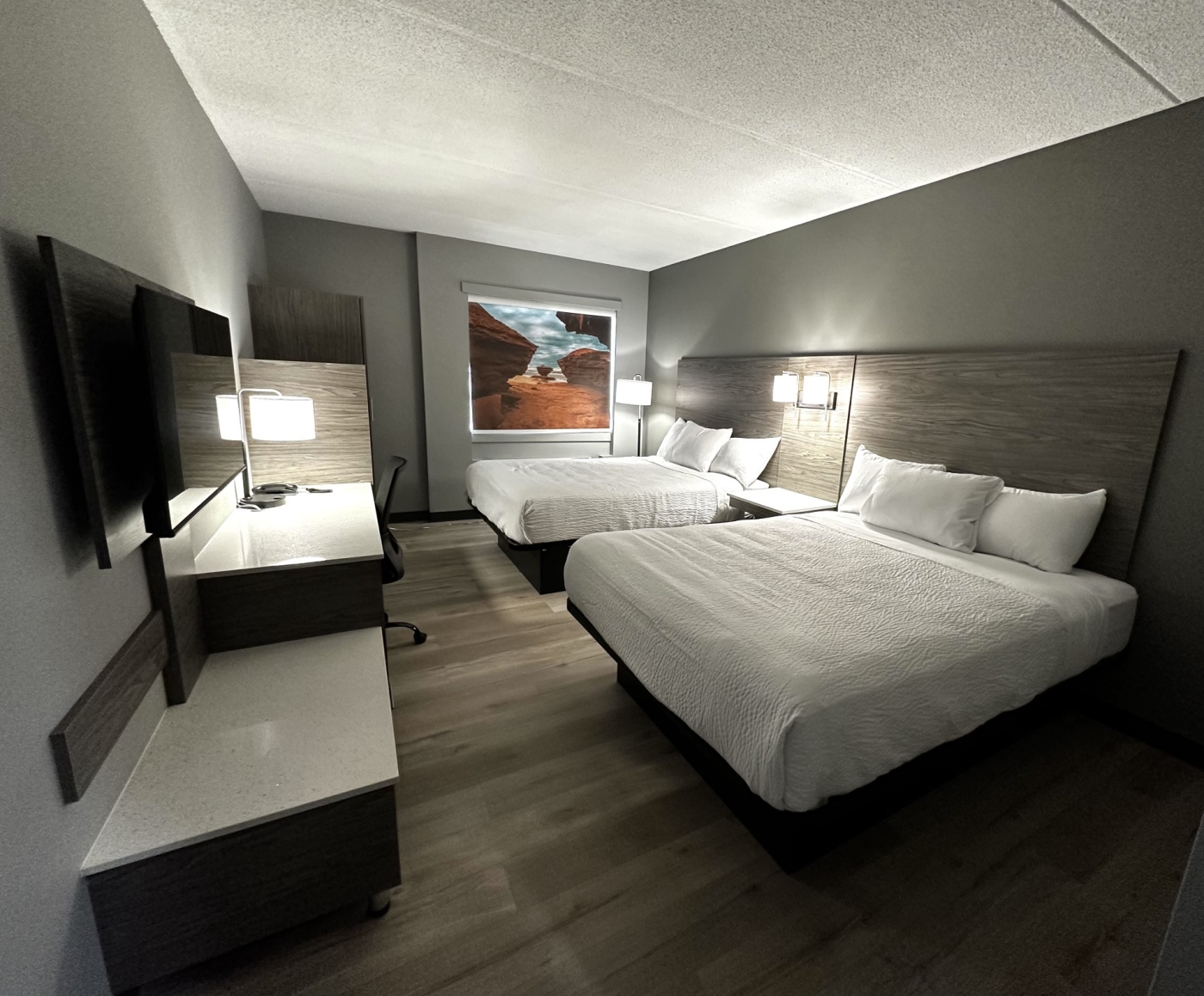 Days Inn photo of two beds and motel room at days inn. white coverlets with grey interior room