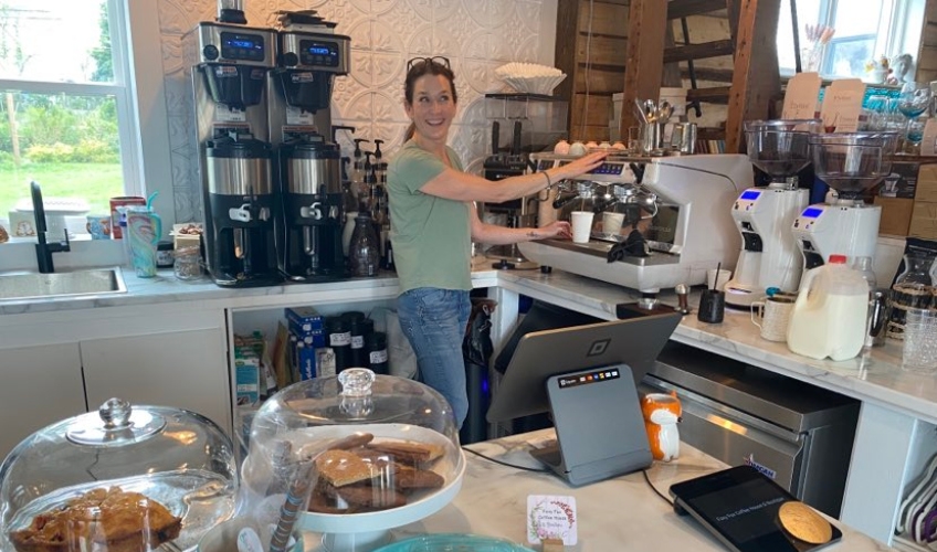 Foxy Fox Coffee House & Boutique, Crapaud, PEI Operator makes a latte in kitchen of Foxy Fox Coffee House & Boutique