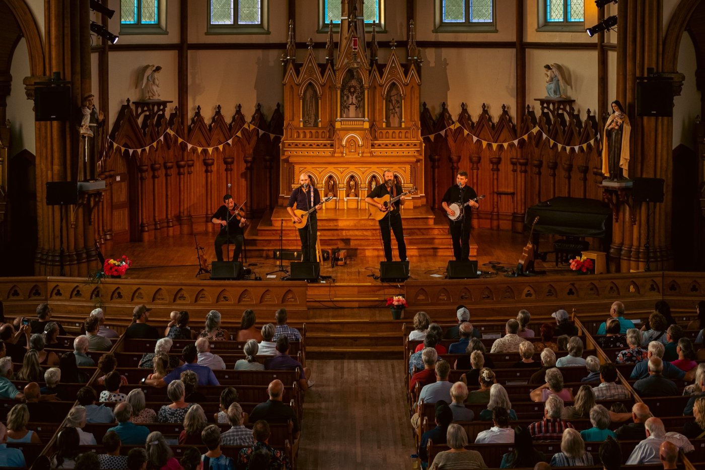 View of musicians on stage at Under the Spire Festival from the balcony