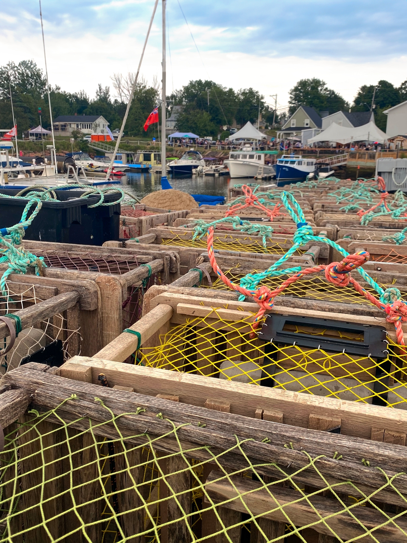 Murray Harbour, PEI Lobster traps with view of harbour and Nellie's Landing in background, Murray Harbour, PEI