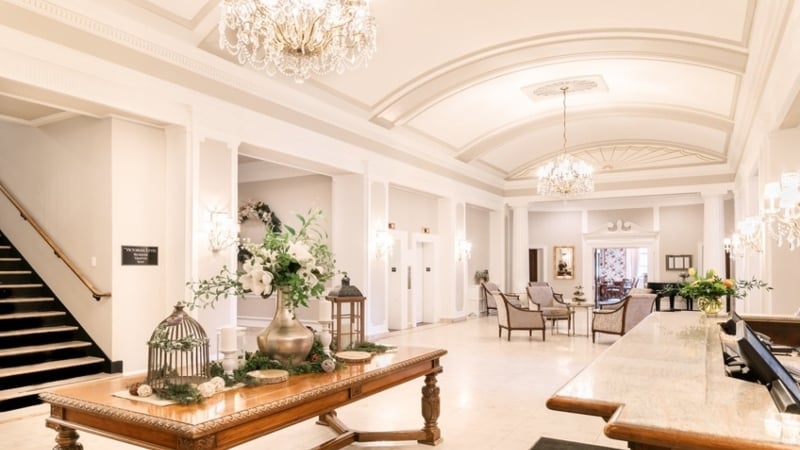 View of Rodd Charlottetown lobby with curved ceilings and chandeliers