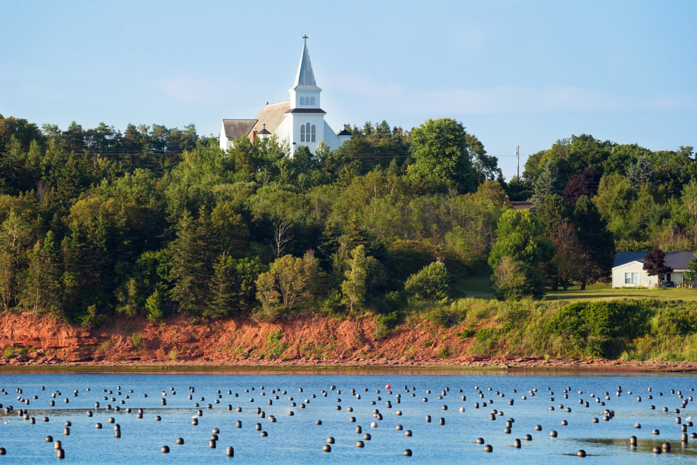 View of Catholic church on the hill from St. Peters Bay