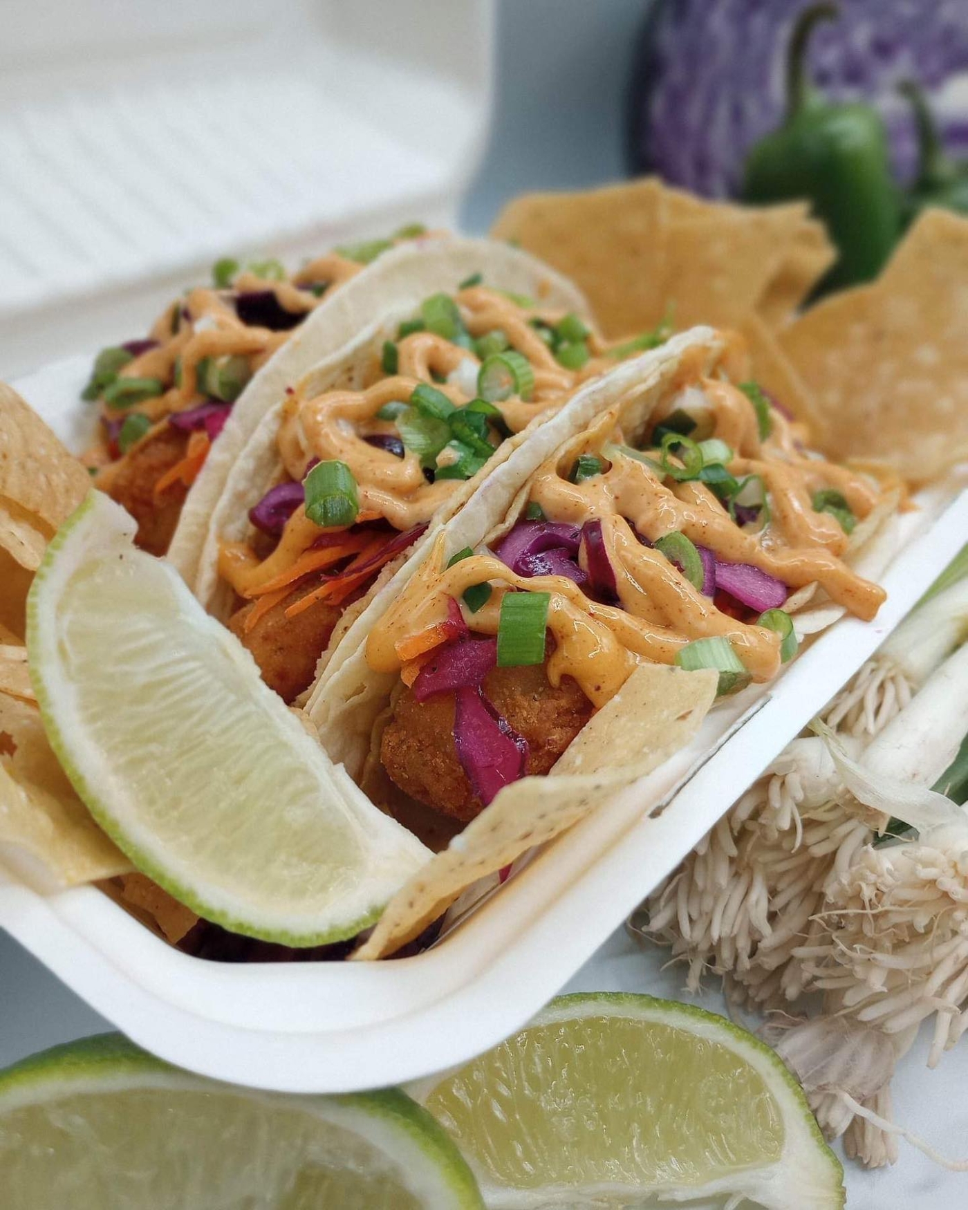 Taco Spot, PEI Fish tacos in take-out dish