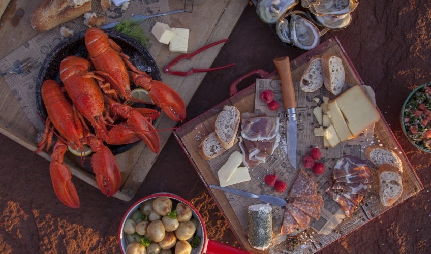 Taste Our Story package, Fairways Cottages PEI beach picnic with cooked lobster, potatoes, oysters, cheese, bread and deli meat