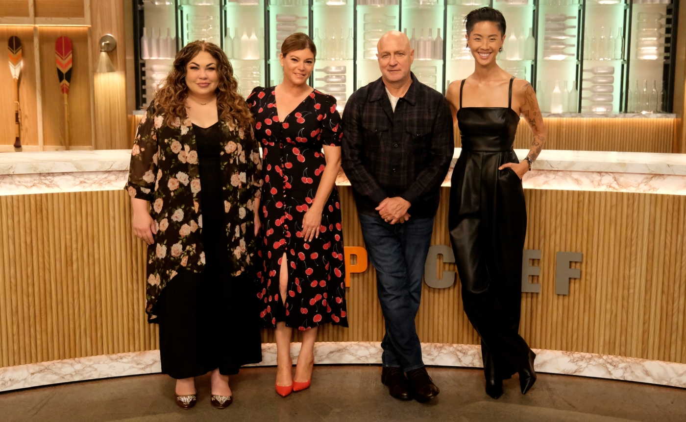 Bravo's Top Chef Image of Chef Ilona Daniel with hosts of Top Chef US on tv set