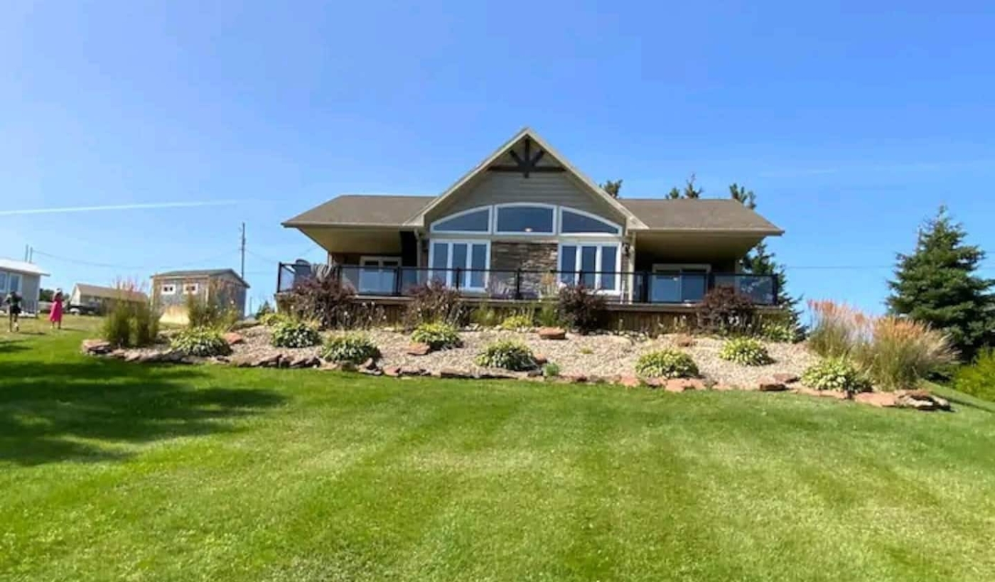 Vincent's outside photo of large cottage with large windows