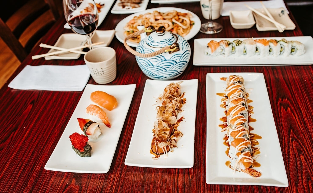 Yumi Sushi PEI Sushi platters and pot of tea set on table at Yumi Sushi