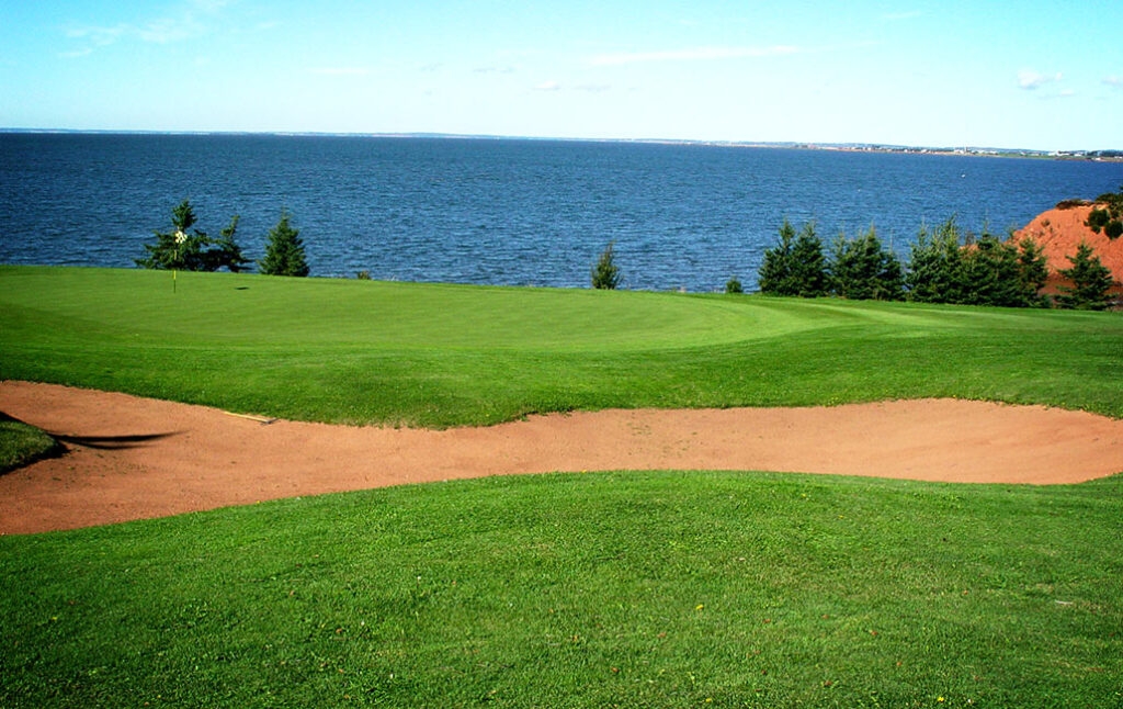 beautiful view of the greens and sandtrap overlooking the water at Belfast highland greens golf course