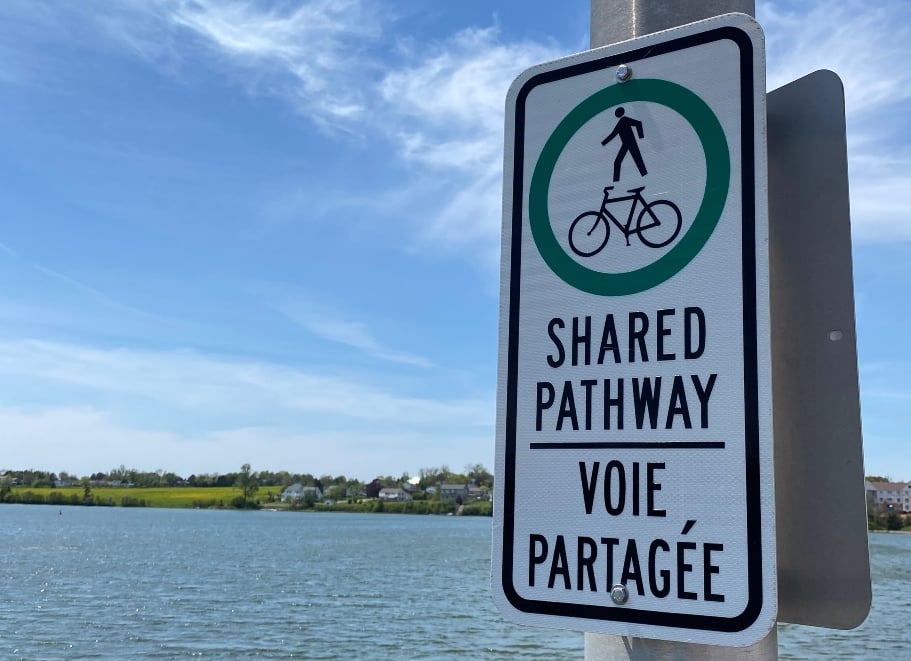 North River, PEI Shared pathway / voie partagee sign on bridge overlooking North River