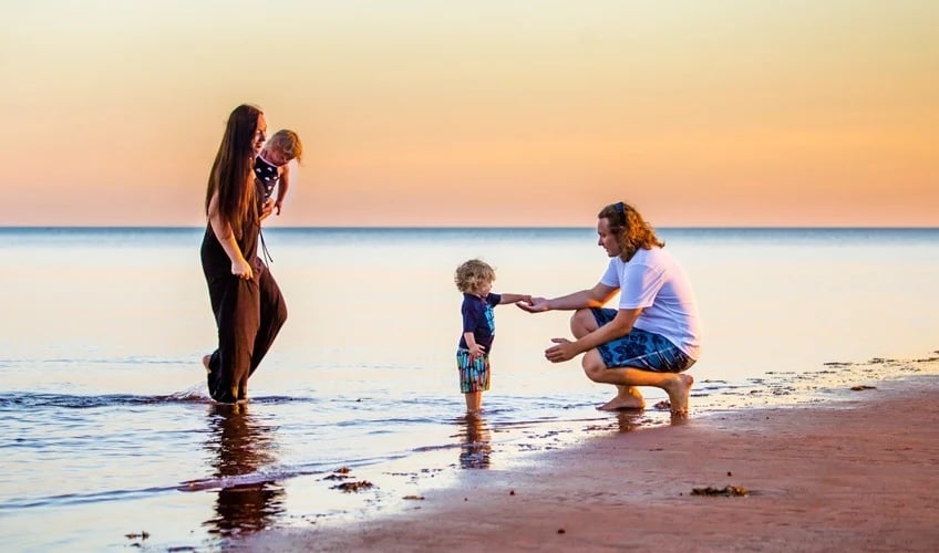 multigenerational family on the beach