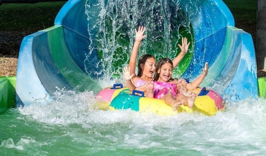 Shining Waters Family Fun Park, PEI Two girls at end of waterslide at Shining Waters Family Fun Park